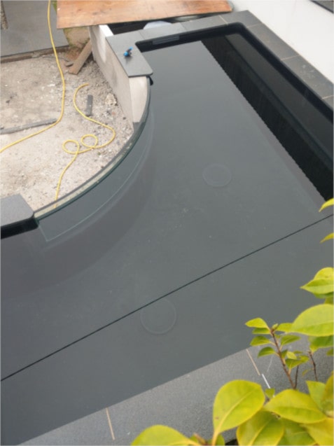 Curved pond glass viewed from above